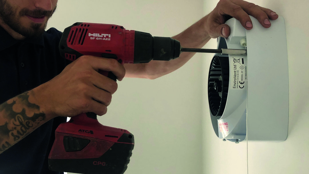 man-installing-envirovent-extractor-fan