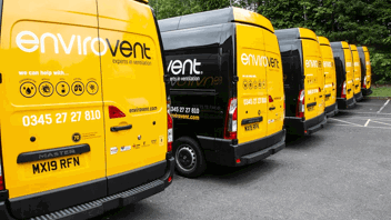 A row of company vans parked