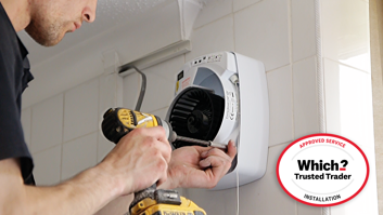 man-installing-bathroom-extractor-fan