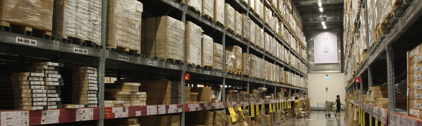 Hundreds of cardboard boxes in a huge warehouse