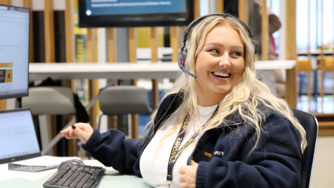 young-woman-laughing-working-customer-care