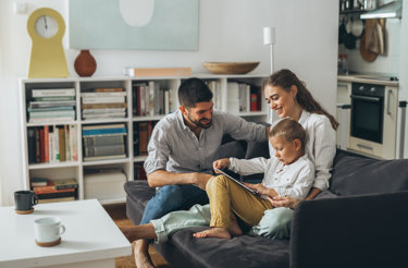 family-sat-in-living-room