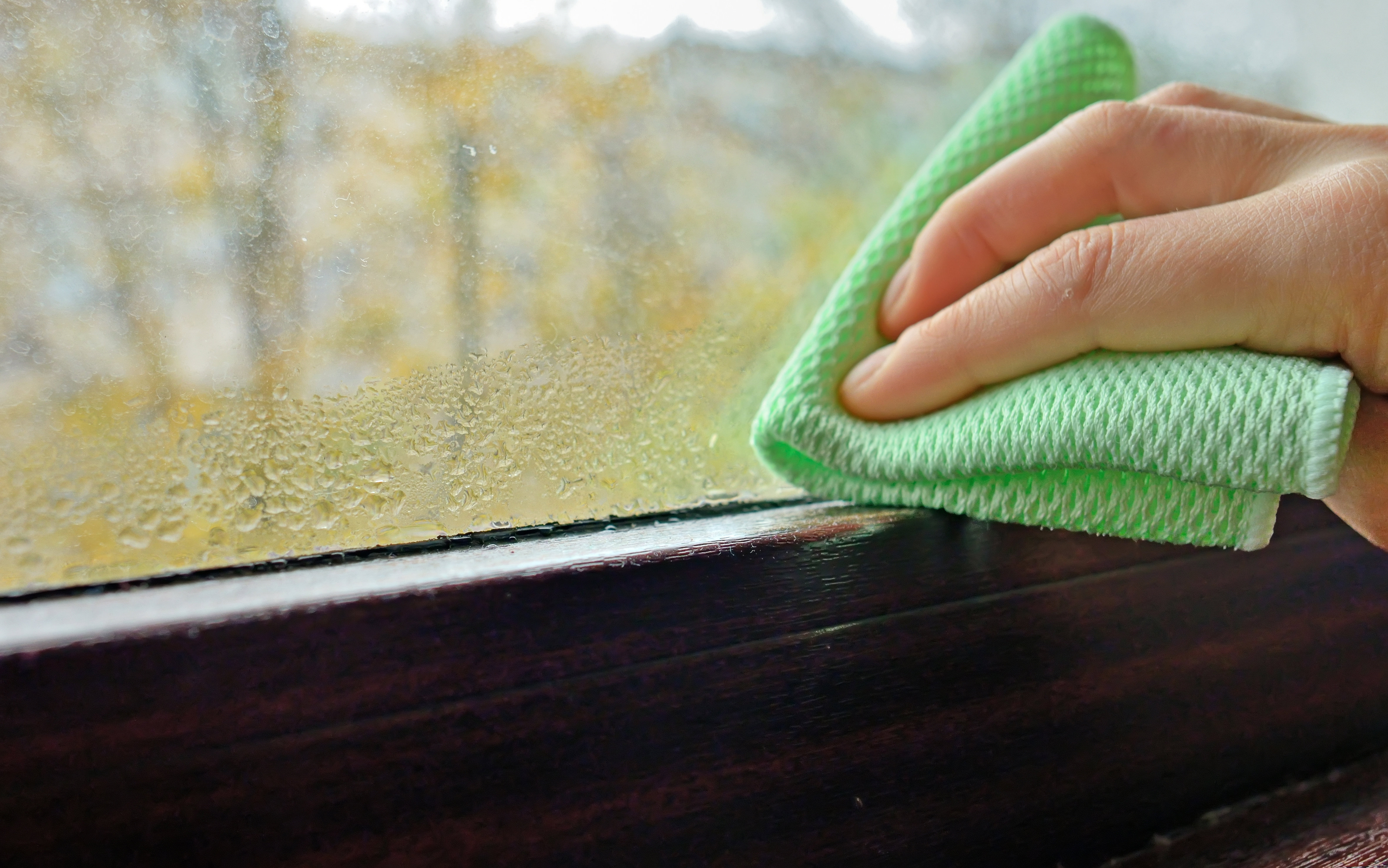 Wiping condensation off a window