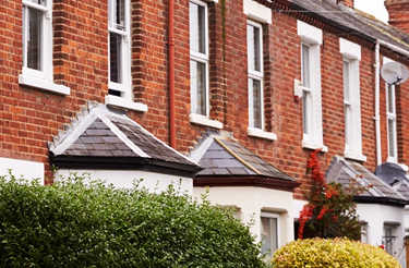line-of-red-brick-houses